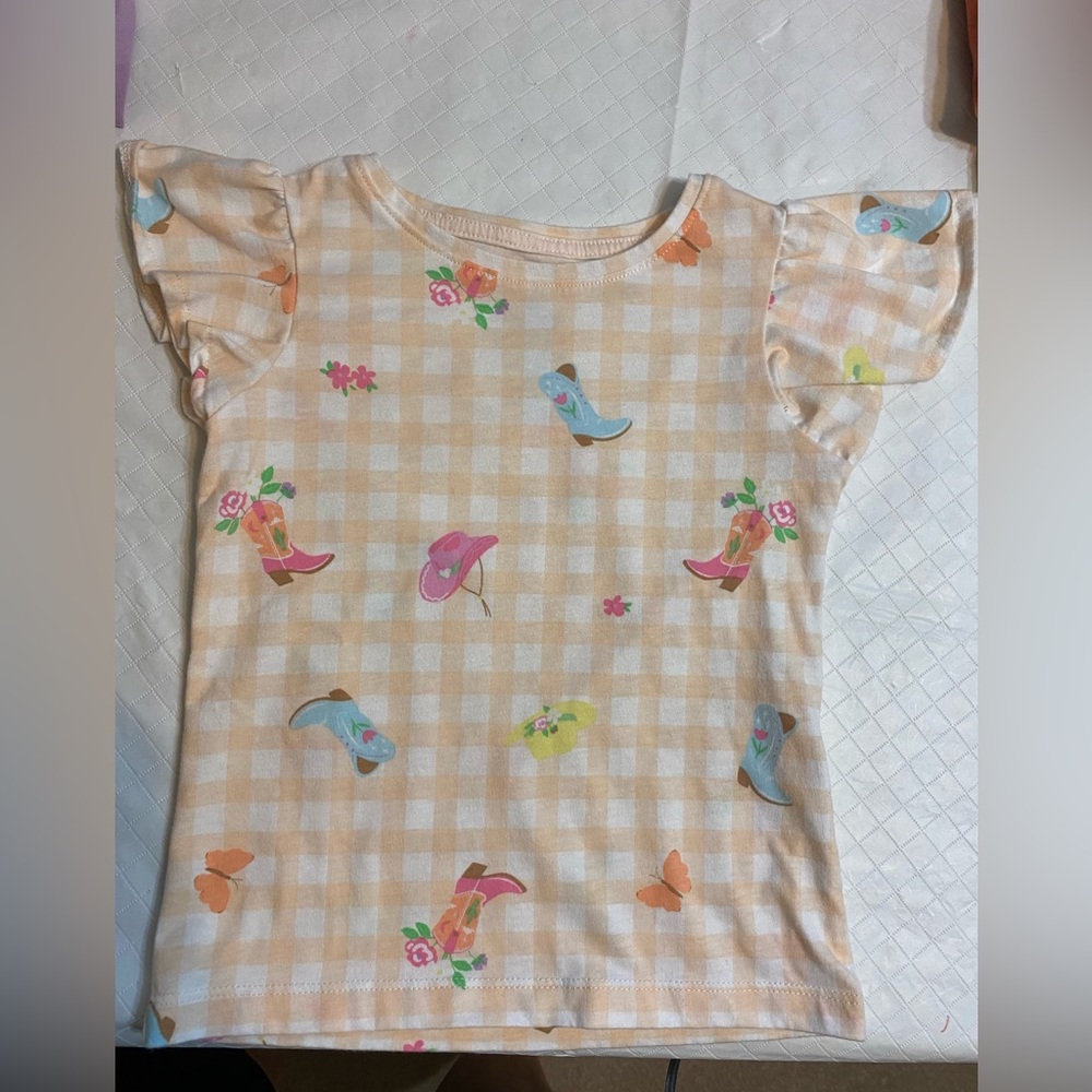 Charming Kids' Peach Checkered Tee with Floral and Boot Design